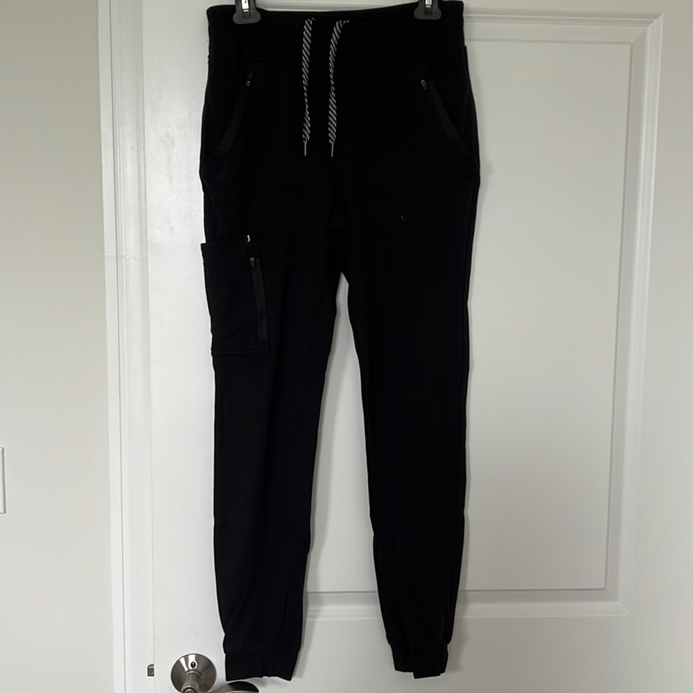 JAANUU Women's 10-Pocket Jogger color Black size Small